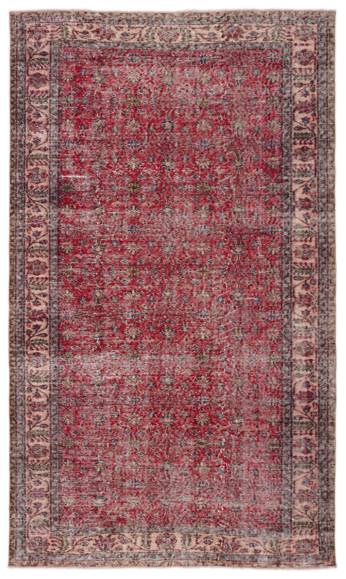 Distressed red traditional rug with a central floral medallion pattern and a detailed geometric border.