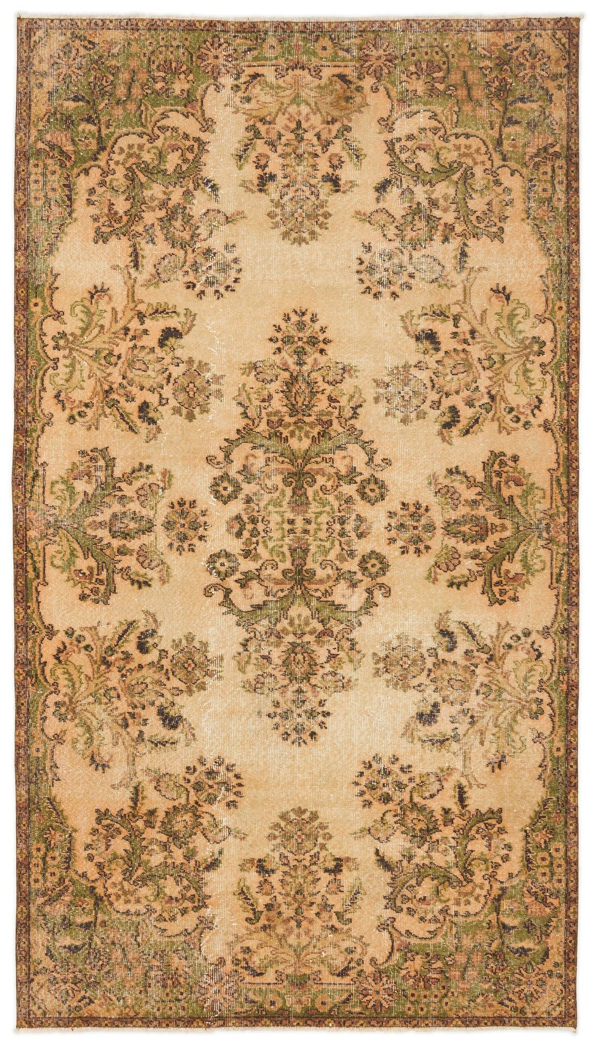 Distressed beige rug with a green and brown floral medallion pattern and a decorative border.
