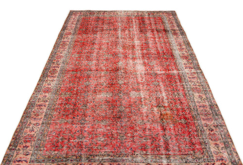 Load image 1 in gallery view. Distressed red and cream vintage-style rug with a faded traditional medallion pattern and a detailed border.