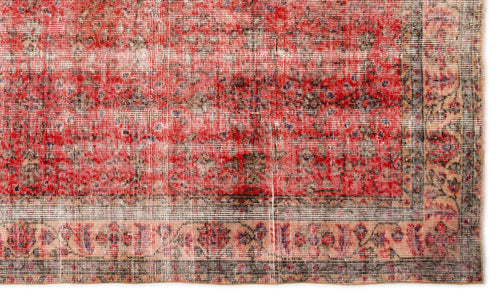Load image 1 in gallery view. Distressed red and beige rug with a faded floral border and traditional medallion pattern on a white background.