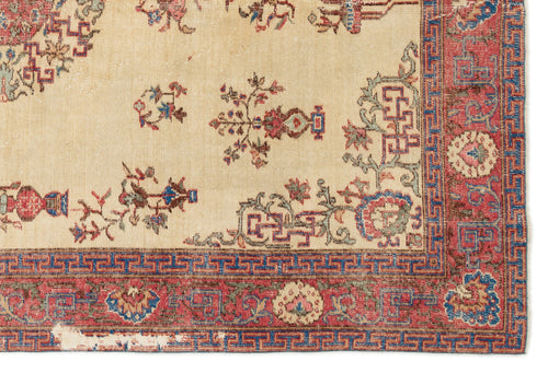Load image 1 in gallery view. Beige rug with red and blue floral motifs and a geometric Greek key border.