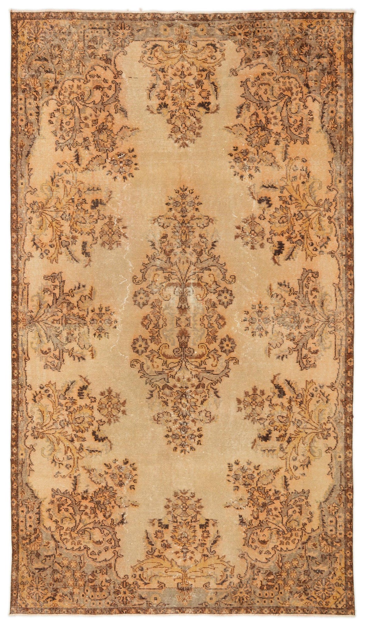 Distressed tan and brown vintage-style rug with a central floral medallion and ornate border pattern.