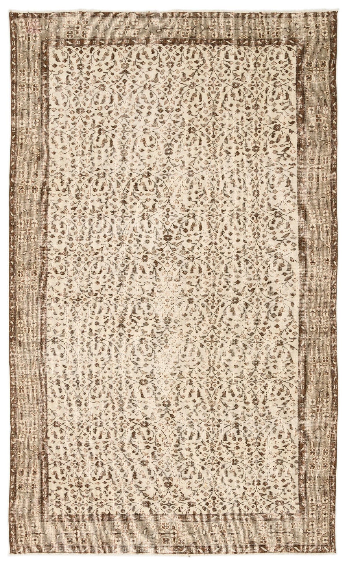 Cream and brown vintage-style rug with a repeating floral medallion pattern and a wide, distressed border.