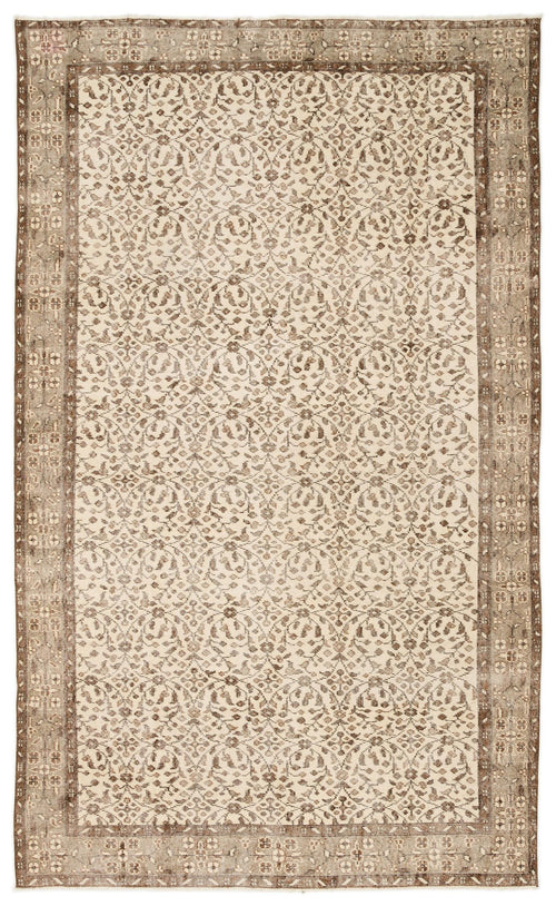 Load image 1 in gallery view. Cream and brown vintage-style rug with a repeating floral medallion pattern and a wide, distressed border.