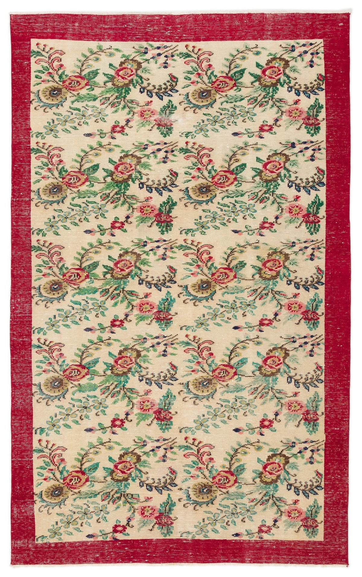 Cream rug with a repeating floral pattern in red, green, and blue, featuring a solid red border.