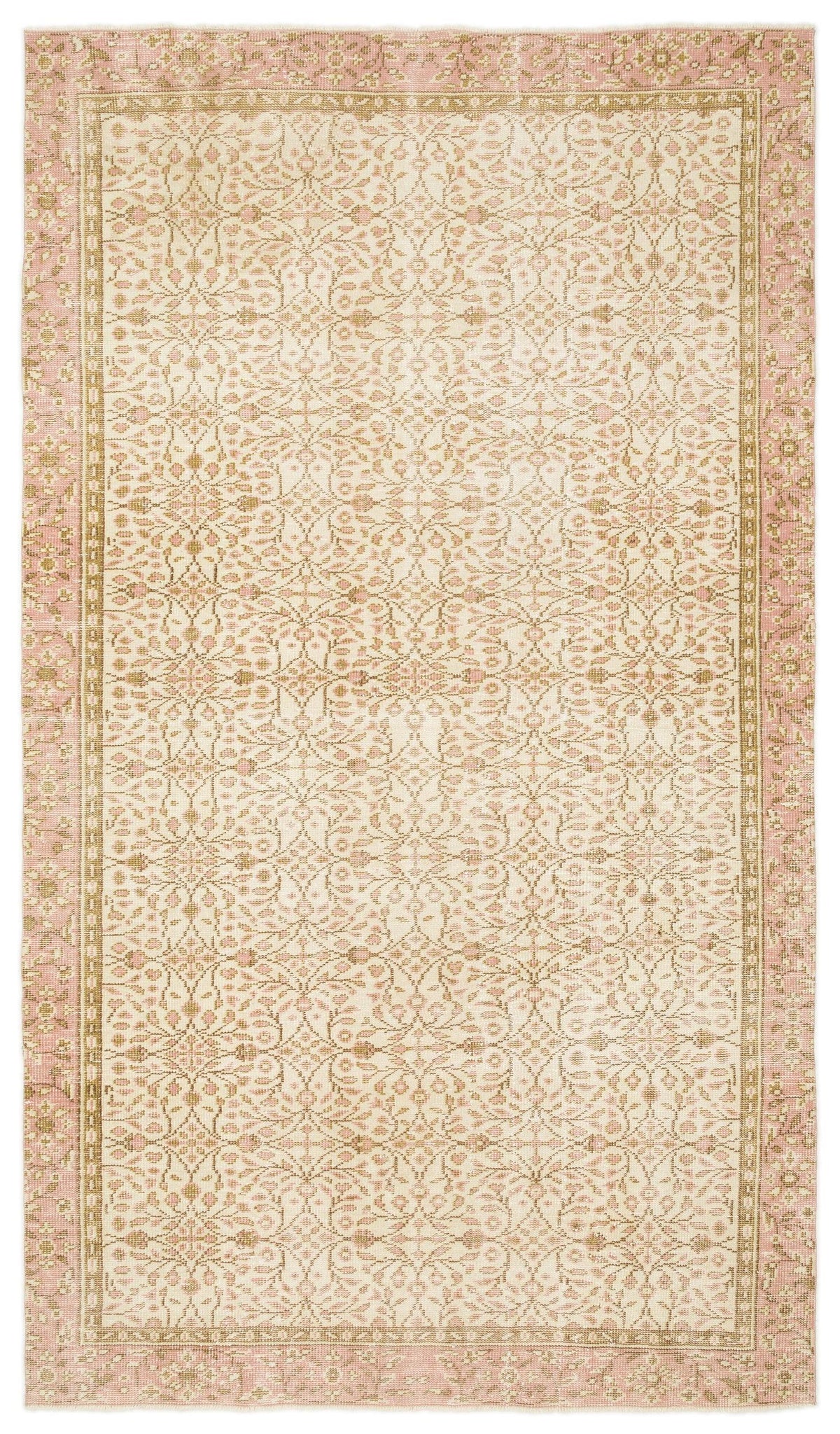 Blush pink and beige vintage-style rug with an intricate floral medallion pattern and a decorative border.