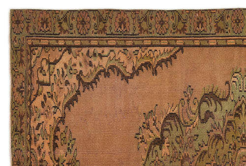 Load image 1 in gallery view. Rust and olive green traditional rug with a floral border and ornate corner medallion pattern.