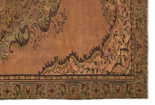 Load image 1 in gallery view. Rust and olive green traditional rug with a central medallion and floral border pattern.