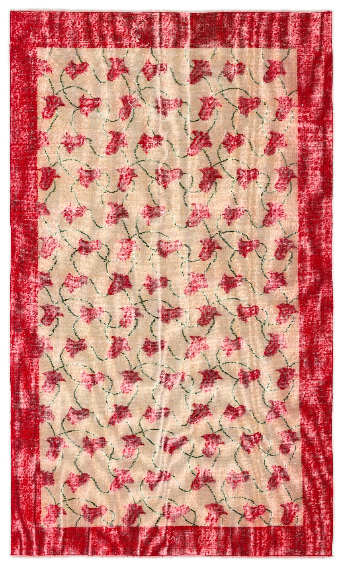 Peach rug with a red border and a repeating pattern of red floral motifs connected by thin green vines.