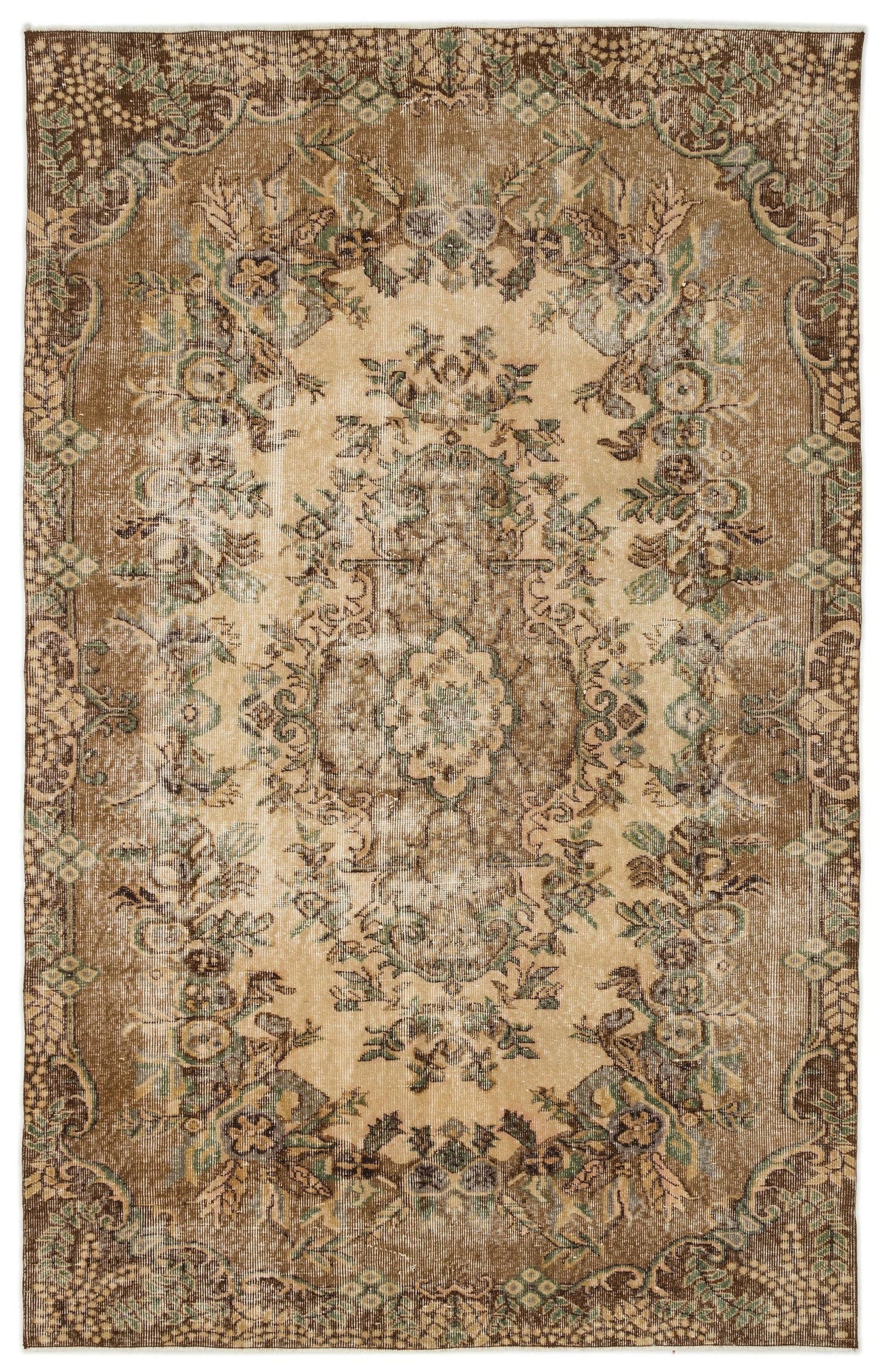 Distressed brown and beige vintage-style rug with a central floral medallion and ornate border.