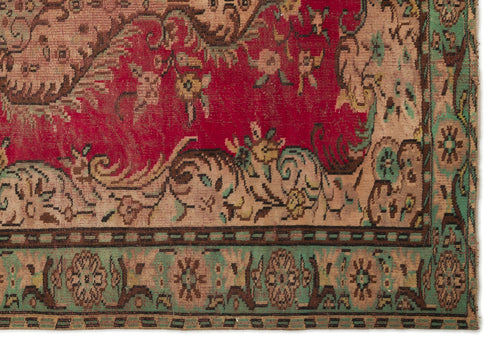 Load image 1 in gallery view. Traditional Persian-style rug with a red field, beige floral motifs, and a green border with geometric accents.