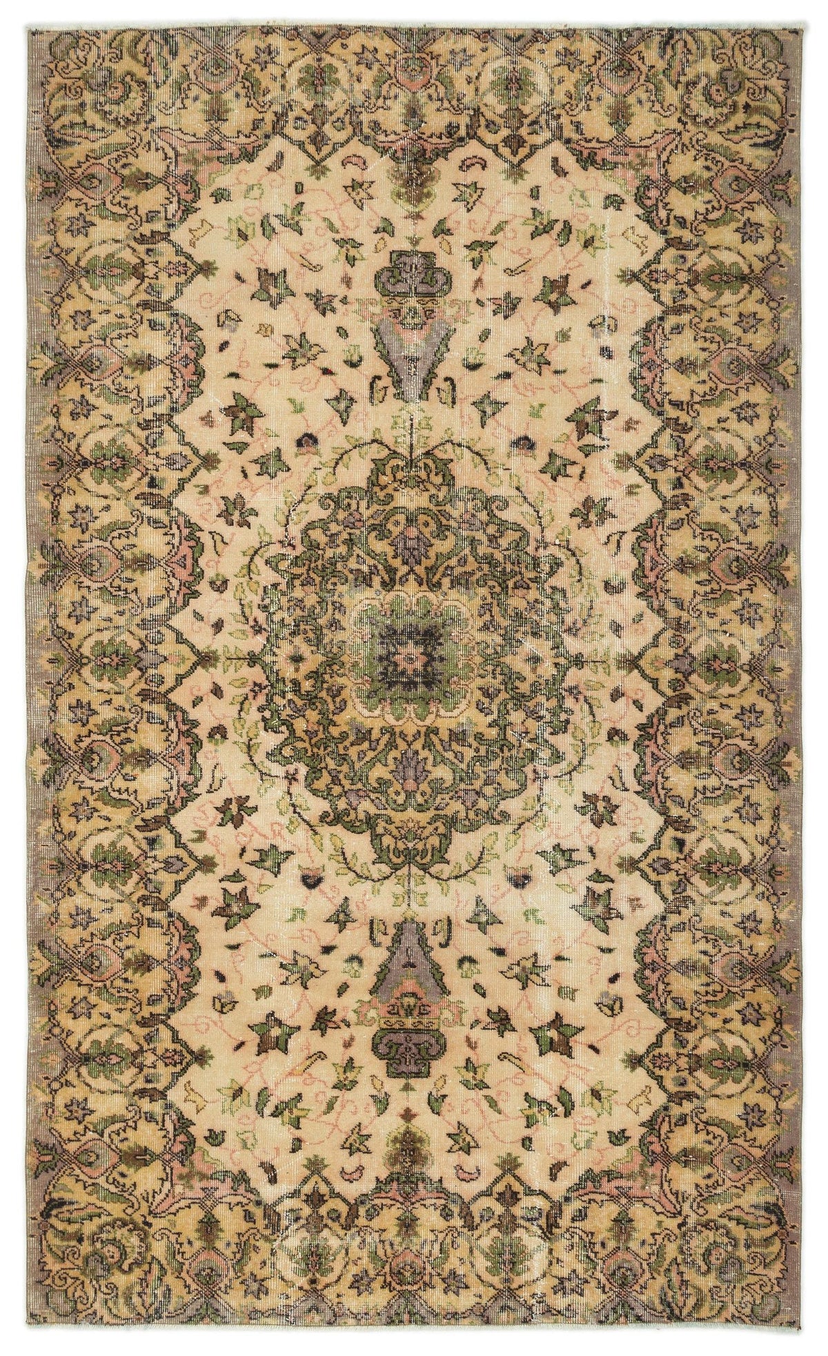 Beige traditional rug with a central floral medallion and ornate border in muted green, pink, and charcoal tones.
