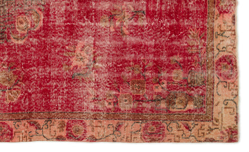 Load image 1 in gallery view. Distressed red vintage rug with faded floral patterns and a tan border, isolated on a white background.