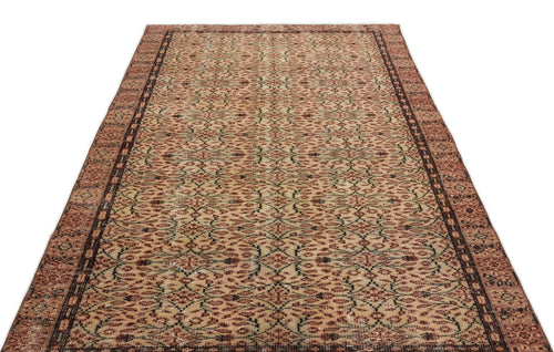 Load image 1 in gallery view. Distressed terracotta and beige rug with a repeating floral lattice pattern and a dark brown border.