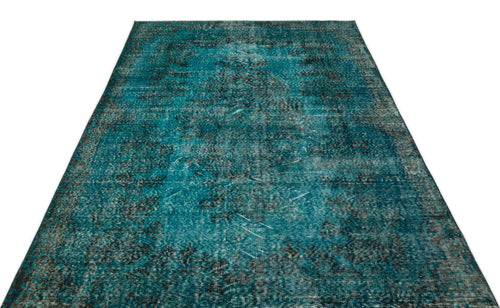 Load image 1 in gallery view. Teal and black distressed vintage-style rug with a faded traditional medallion pattern on a white background.