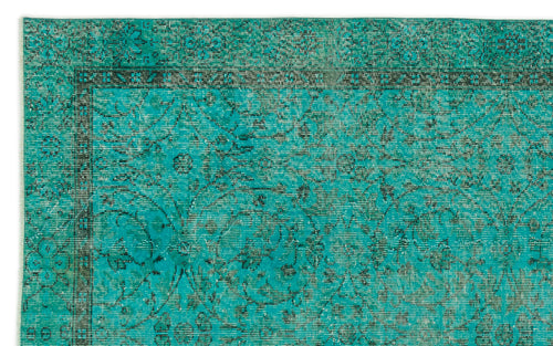 Load image 1 in gallery view. Teal and black distressed rug with a traditional floral medallion pattern and a detailed border.