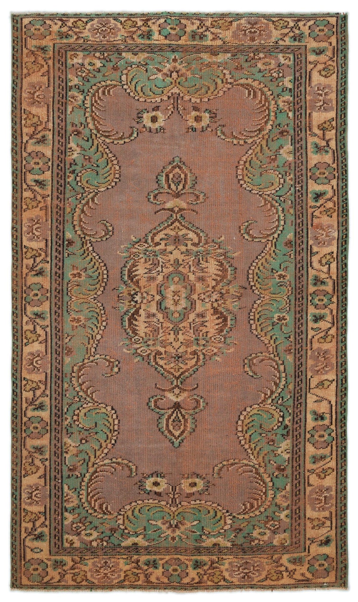 Distressed mauve, teal, and tan traditional rug with a central floral medallion and ornate border.