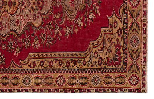 Load image 1 in gallery view. Red and tan traditional rug with a floral medallion pattern and intricate geometric border.