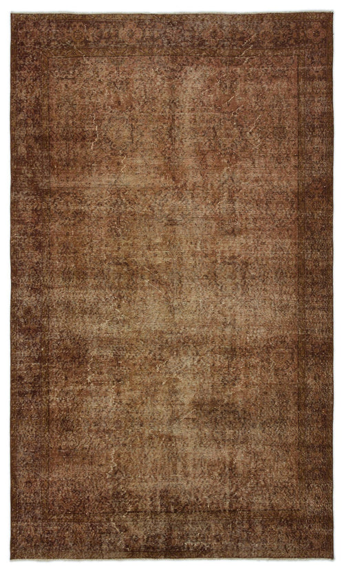 Load image 1 in gallery view. Dark brown distressed traditional rug with a faded central medallion and ornate border.
