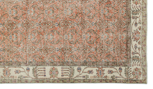Load image 1 in gallery view. Terracotta and cream traditional rug with a distressed floral medallion pattern and a wide decorative border.