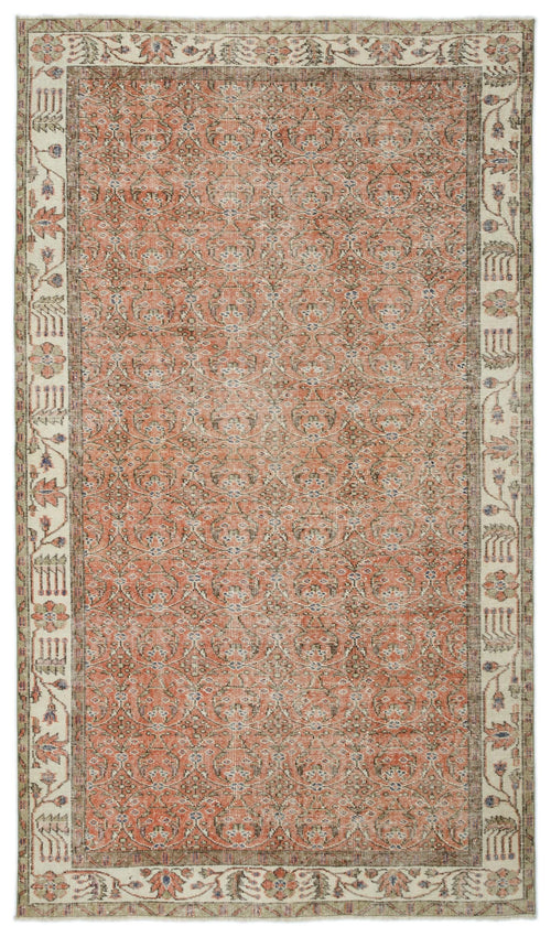 Load image 1 in gallery view. Terracotta and cream vintage-style rug with an all-over floral medallion pattern and a wide decorative border.
