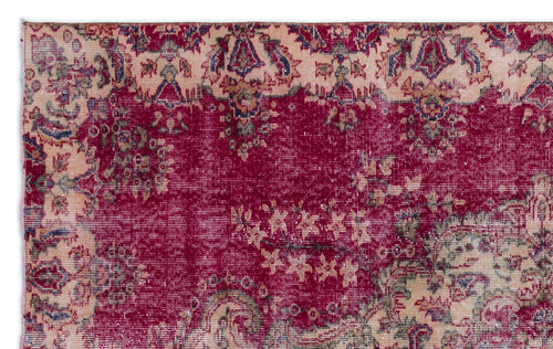 Load image 1 in gallery view. Deep magenta and cream vintage-style rug with a distressed floral medallion pattern.