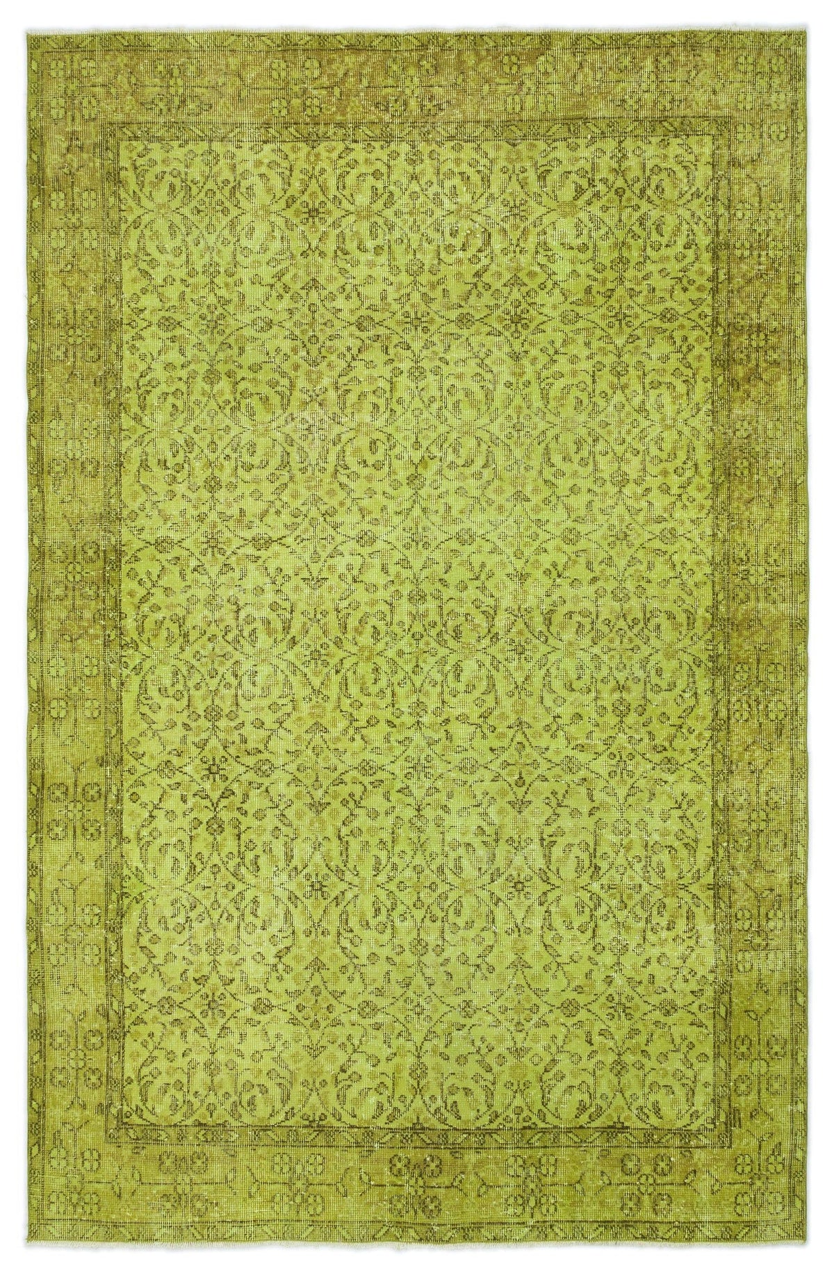 Chartreuse vintage-style rug with a distressed floral medallion pattern and a wide decorative border.