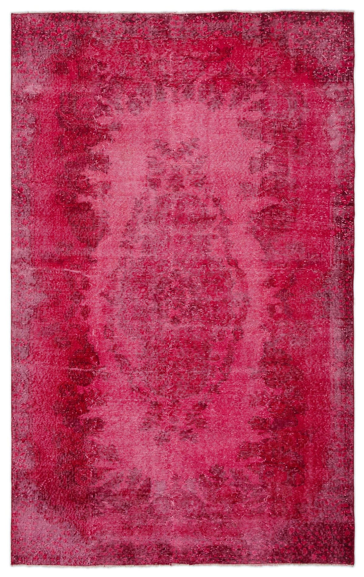 Magenta distressed vintage-style rug with a faded central medallion pattern on a white background.