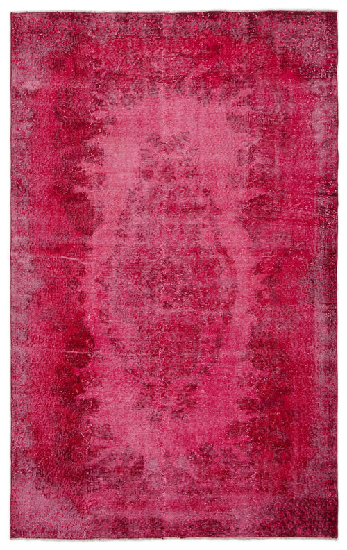 Load image 1 in gallery view. Magenta distressed vintage-style rug with a faded central medallion pattern on a white background.