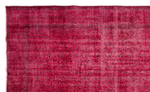 Load image 1 in gallery view. Deep magenta vintage-style rug with a distressed, faded traditional medallion pattern.