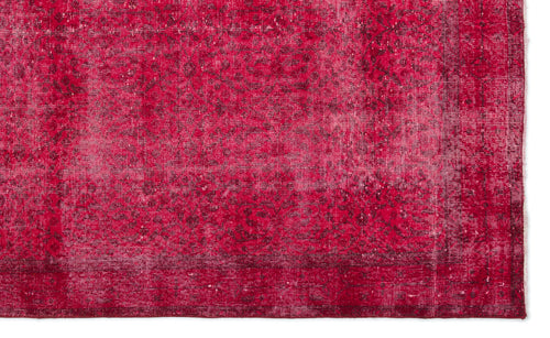 Load image 1 in gallery view. Vibrant red distressed rug with a faded traditional floral medallion pattern and a dark border.