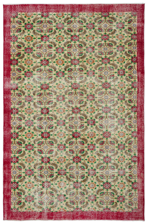 Load image 1 in gallery view. Beige rug with a red border and a repeating floral medallion pattern in red, green, and blue on a white background.
