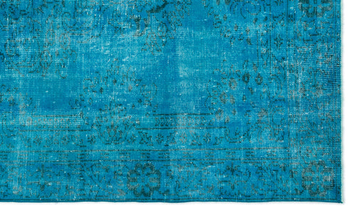 Load image 1 in gallery view. Bright turquoise rug with a distressed, faded traditional floral medallion pattern and a decorative border.