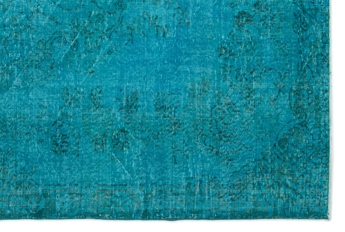 Load image 1 in gallery view. Teal distressed rug with a faded traditional floral pattern on a white background.