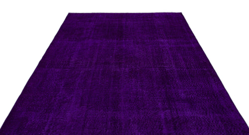 Load image 1 in gallery view. Deep purple overdyed vintage rug with a subtle, distressed traditional pattern on a white background.