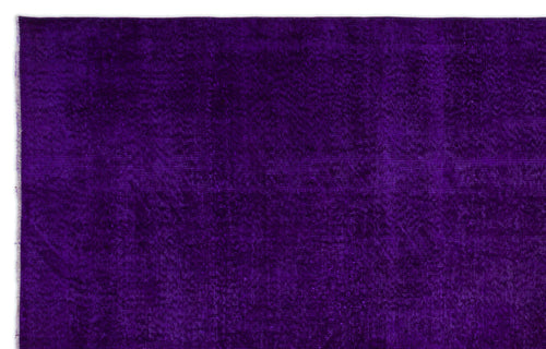 Load image 1 in gallery view. Solid deep purple rug with a subtle, distressed texture on a white background.