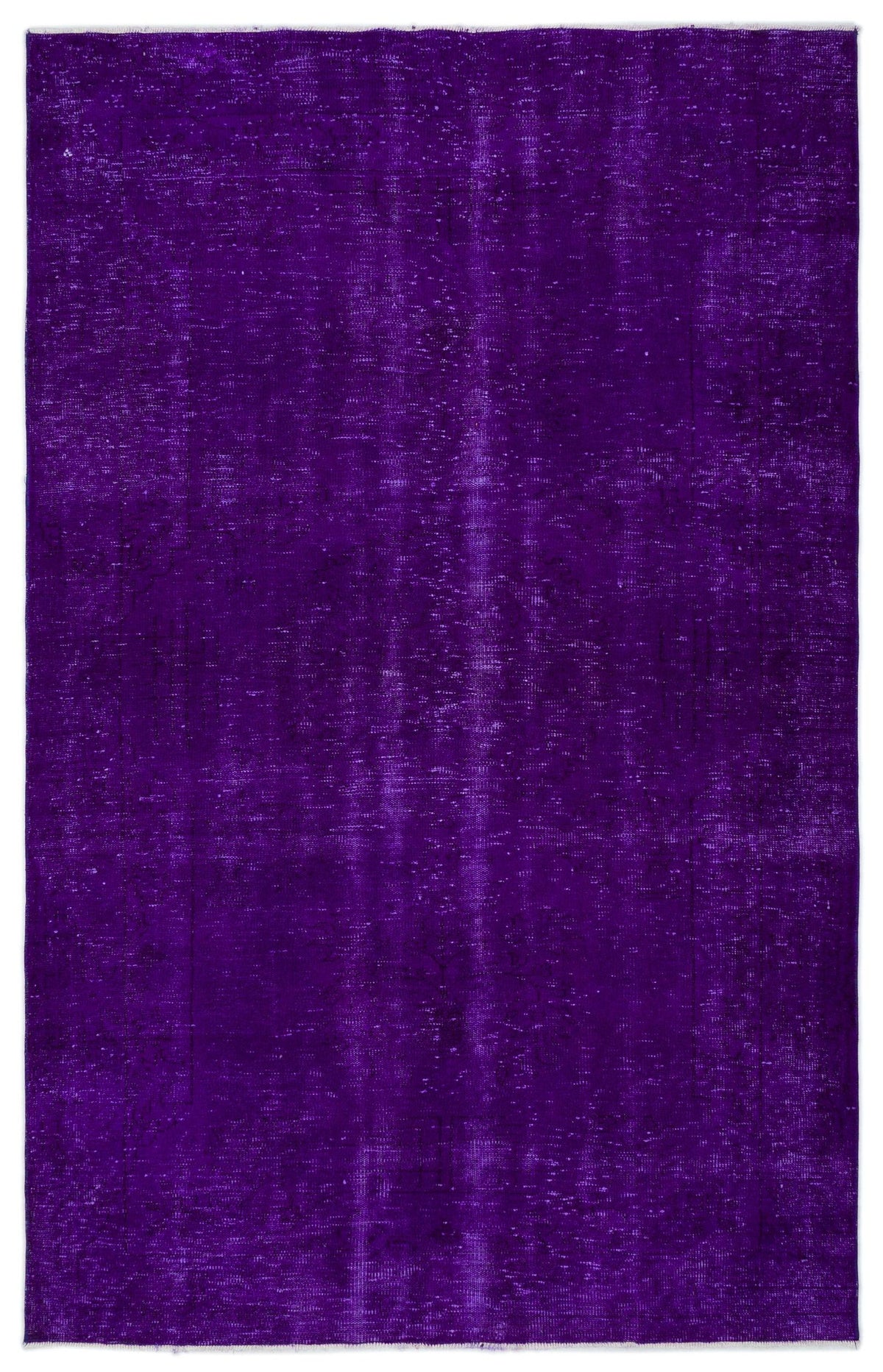 Deep purple vintage-style overdyed rug with a faint, distressed traditional medallion pattern.