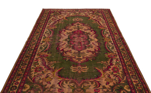 Load image 1 in gallery view. Olive green and crimson traditional rug with a central floral medallion and ornate border on a white background.