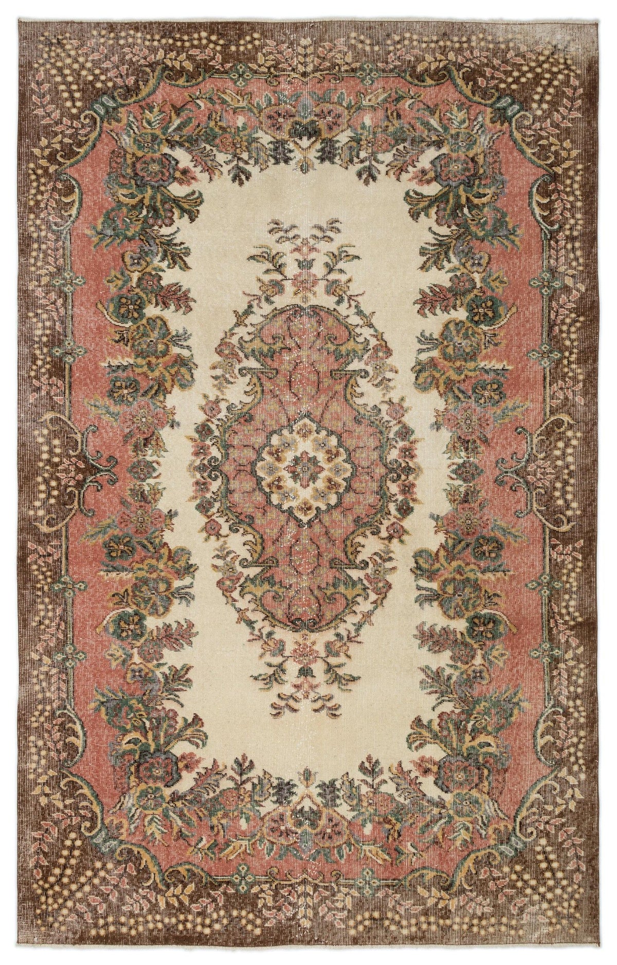 Cream, pink, and brown traditional rug with a central floral medallion and ornate botanical border.