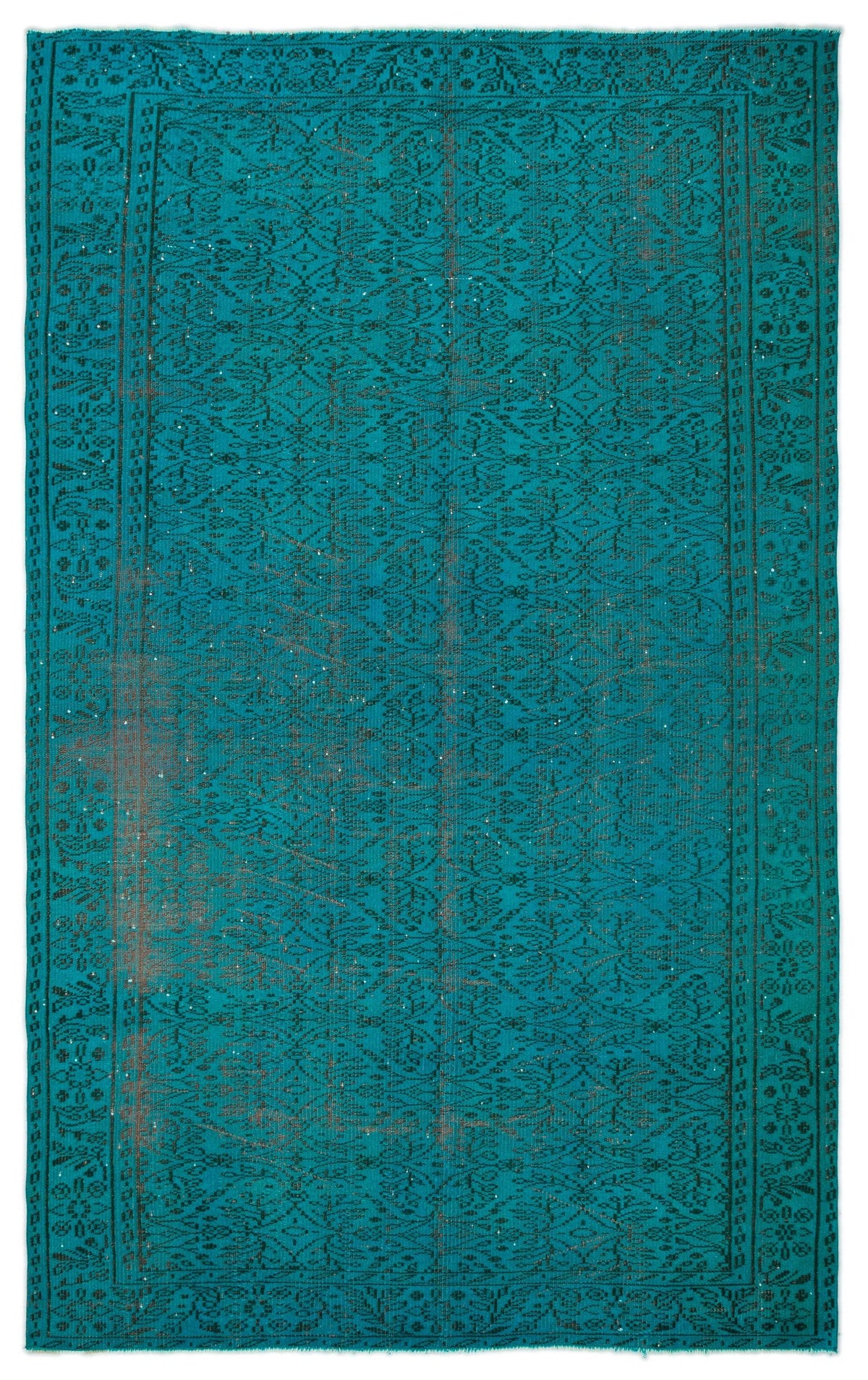 Teal and black vintage-style rug with a distressed floral medallion pattern and a decorative border.
