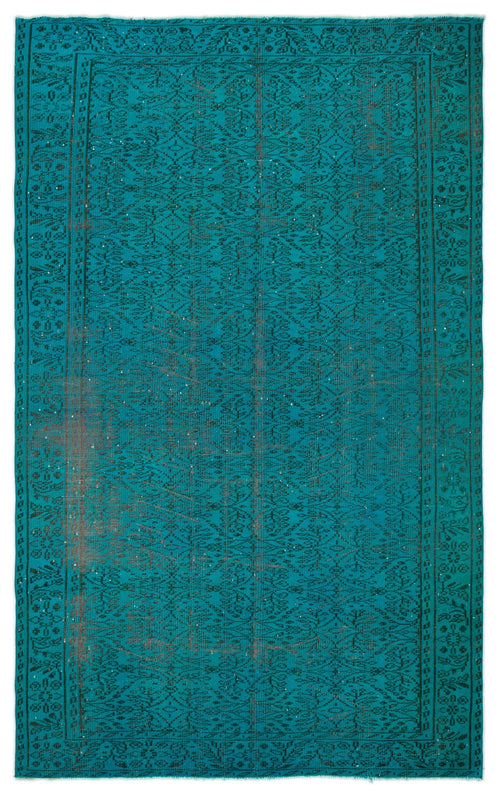 Load image 1 in gallery view. Teal and black vintage-style rug with a distressed floral medallion pattern and a decorative border.
