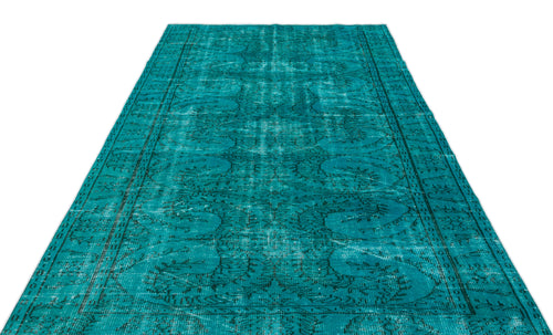 Load image 1 in gallery view. Teal distressed vintage-style rug with a faded traditional floral medallion pattern on a white background.