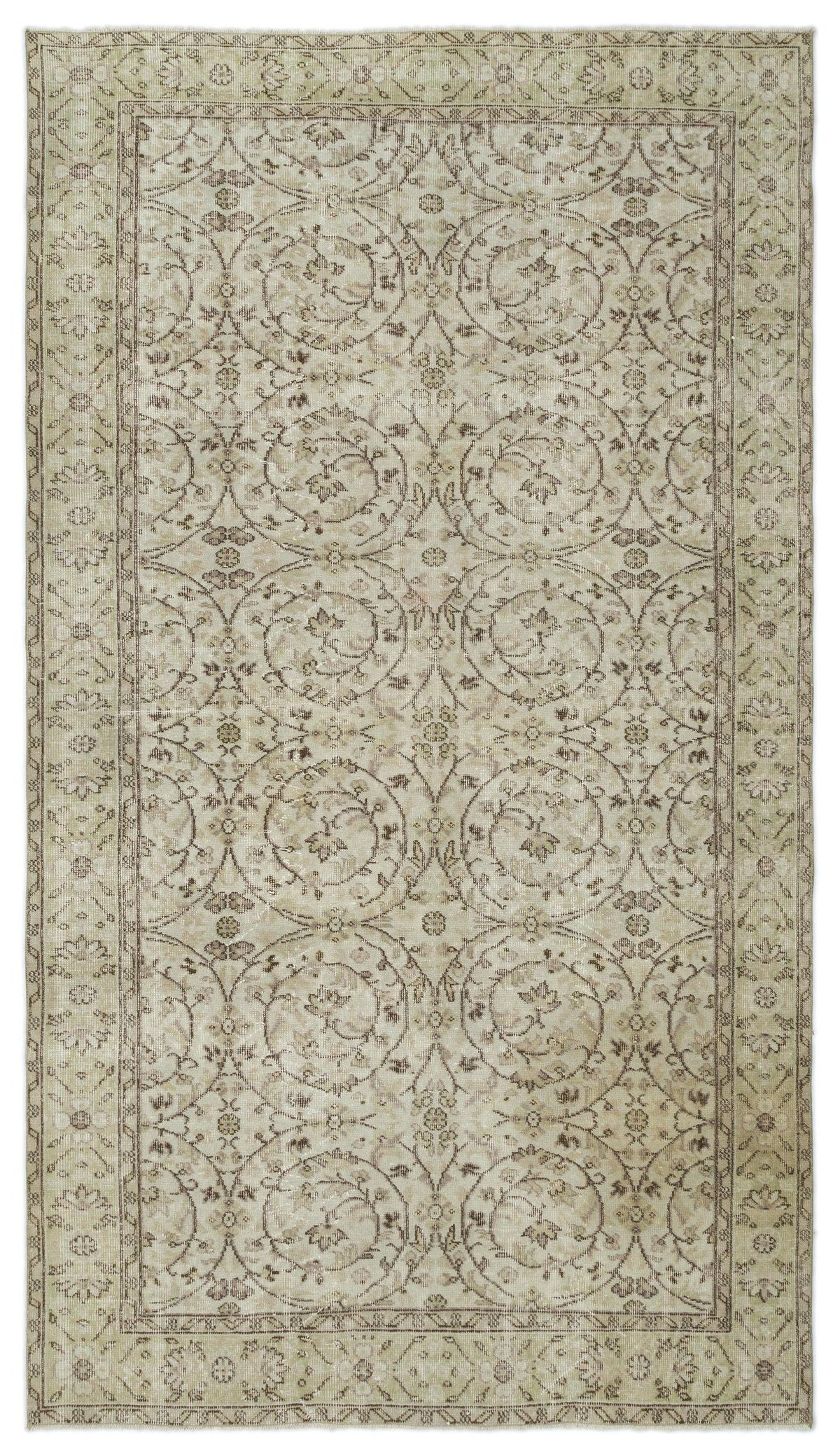 Beige and taupe vintage-style rug with a repeating circular floral medallion pattern and a decorative border.