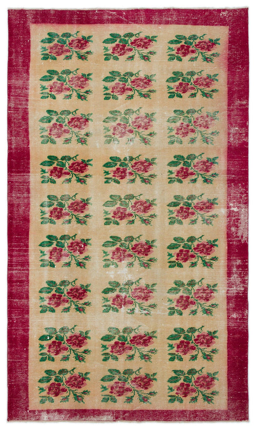 Load image 1 in gallery view. Distressed beige rug with a repeating floral rose pattern and a wide, solid red border.