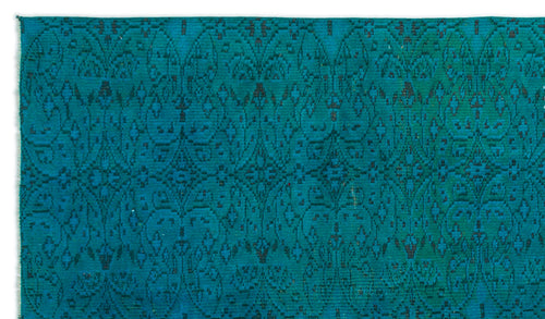 Load image 1 in gallery view. Teal and black flatweave rug featuring a repeating intricate damask-inspired geometric pattern.