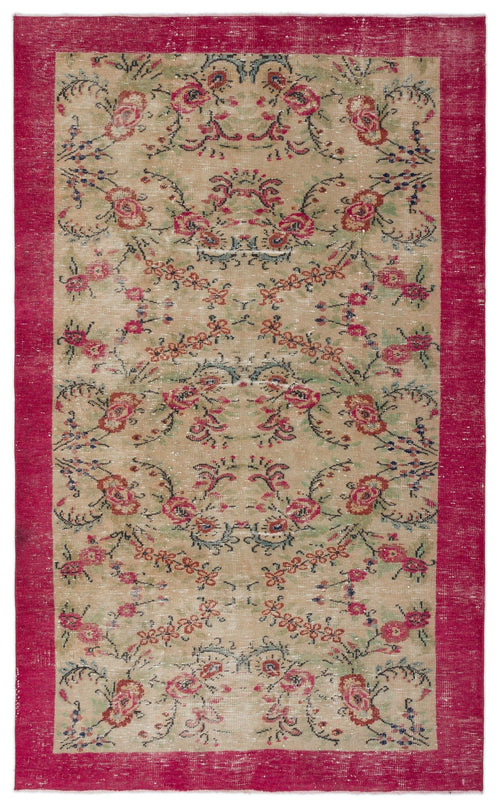 Load image 1 in gallery view. Distressed beige rug with a red border and a repeating floral pattern in red, green, and blue.