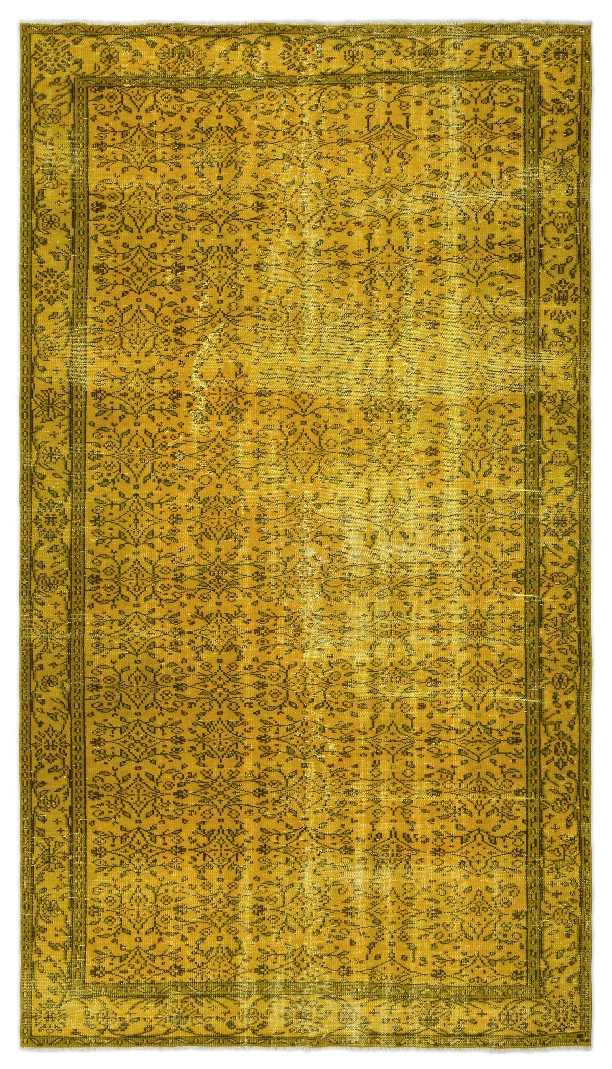 Mustard yellow vintage-style rug with a distressed dark olive floral pattern and a decorative border.