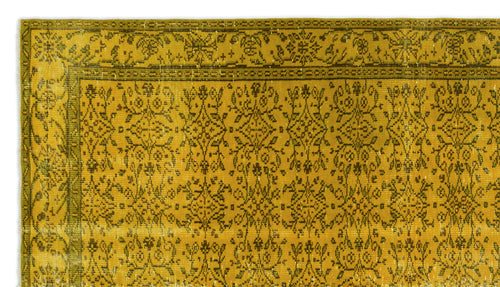 Load image 1 in gallery view. Mustard yellow rug with a dark olive green traditional floral pattern and a decorative border.