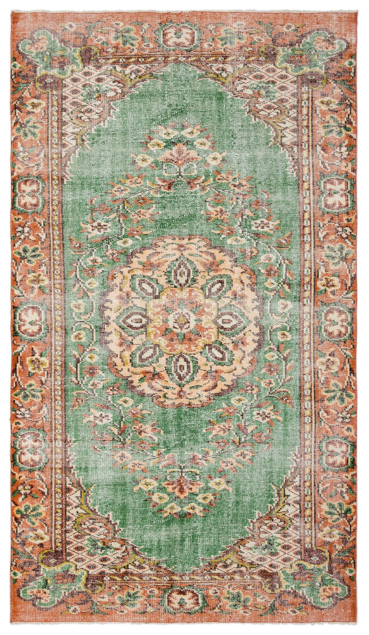 Green and orange vintage-style rug with a central floral medallion and ornate border on a white background.