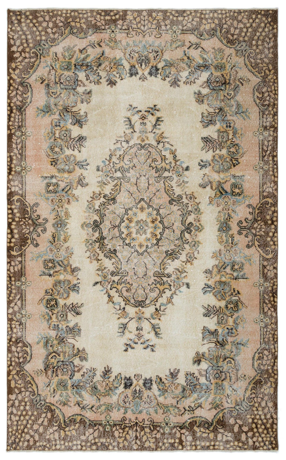 Distressed beige, brown, and muted blue traditional rug with a central floral medallion and ornate border.